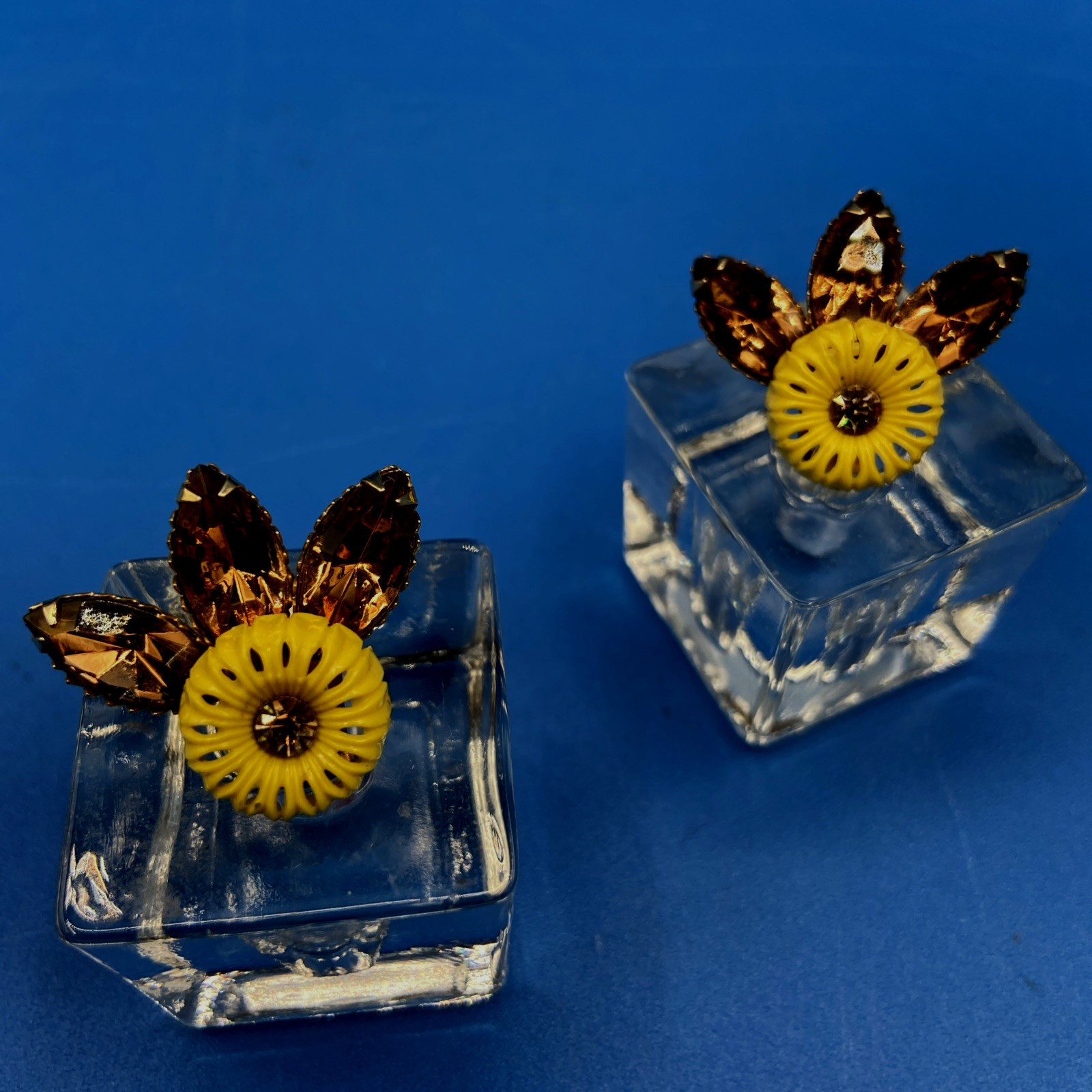 EARRINGS vintage 1960s clip-on Flower Power yellow plastic riveted rhinestones