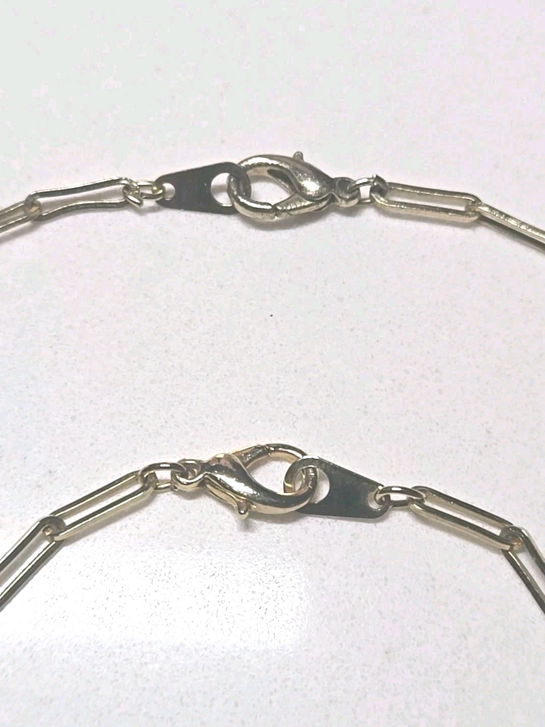 Mid Century 60′ 80′ gold-tone paperclip-style chainoval bezel-set colored Glass