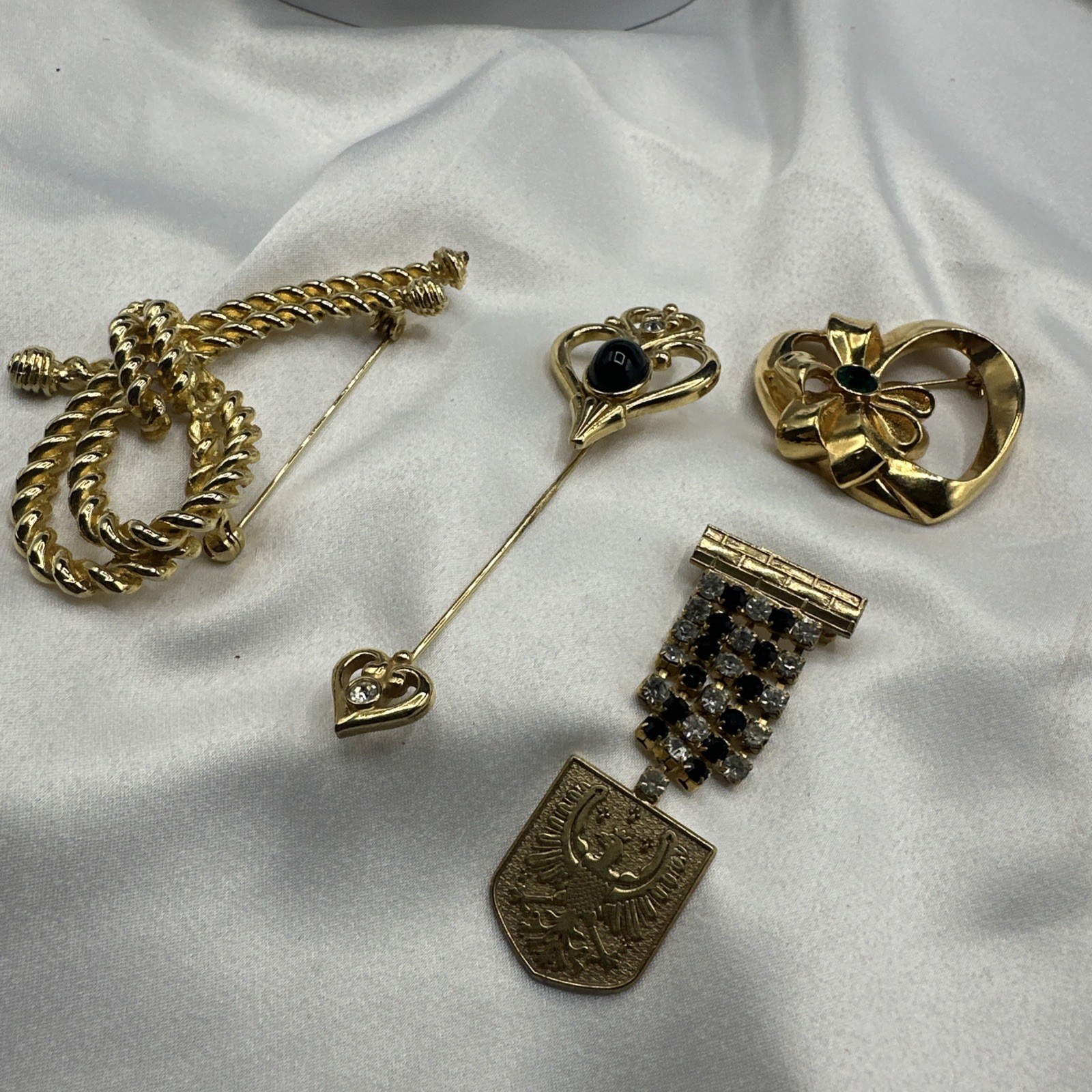 Three Mixed Vtg Gold Toned Brooches and One Pon.See pics.