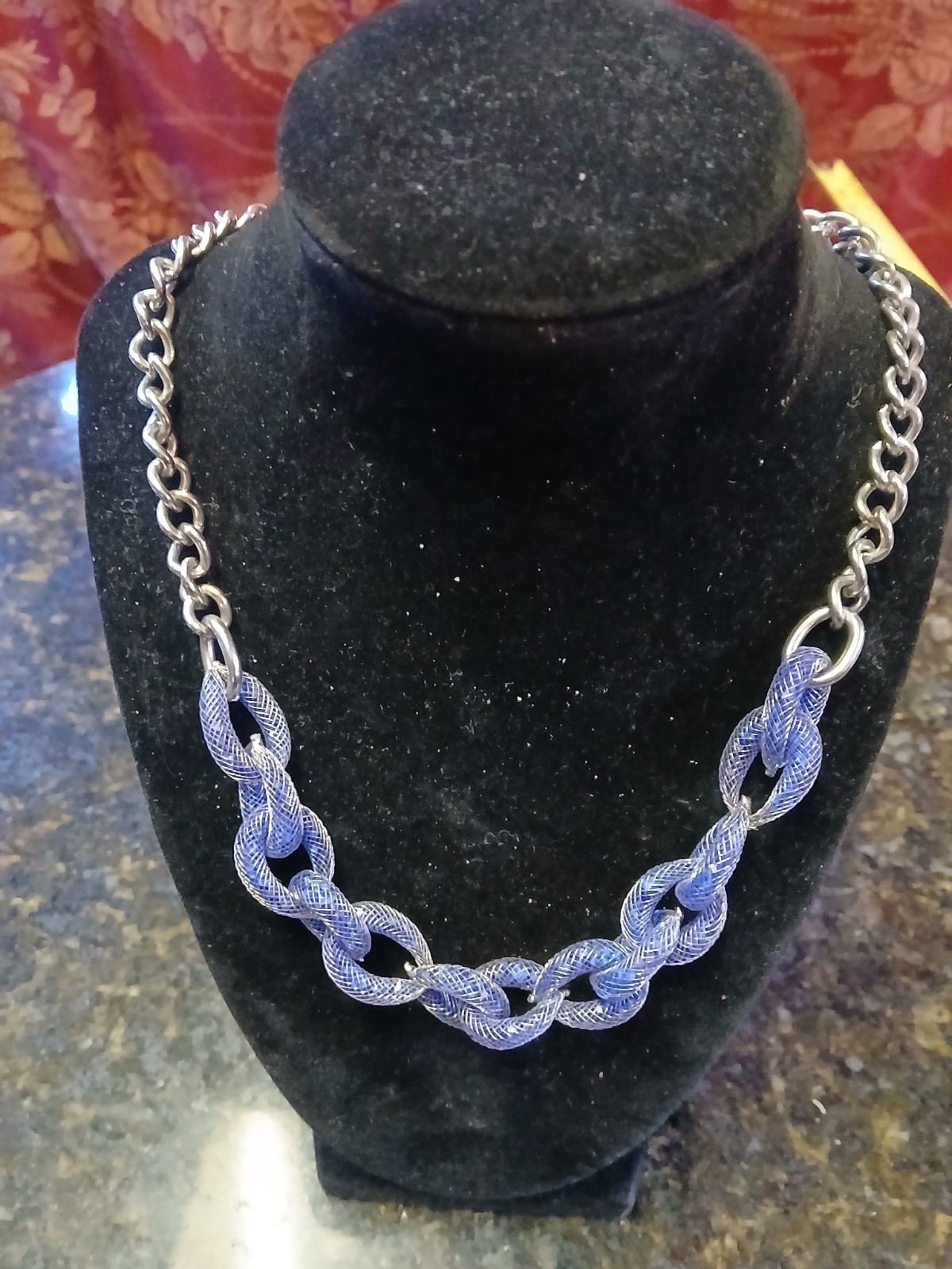 stainless necklace with blue thick chain wire on lower half