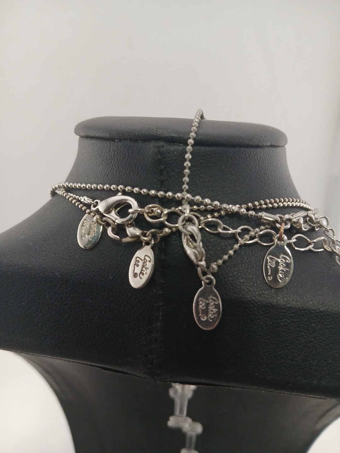 New Old Stock lot of 4 COOKIE LEE silver tone assorted figural pendant necklaces