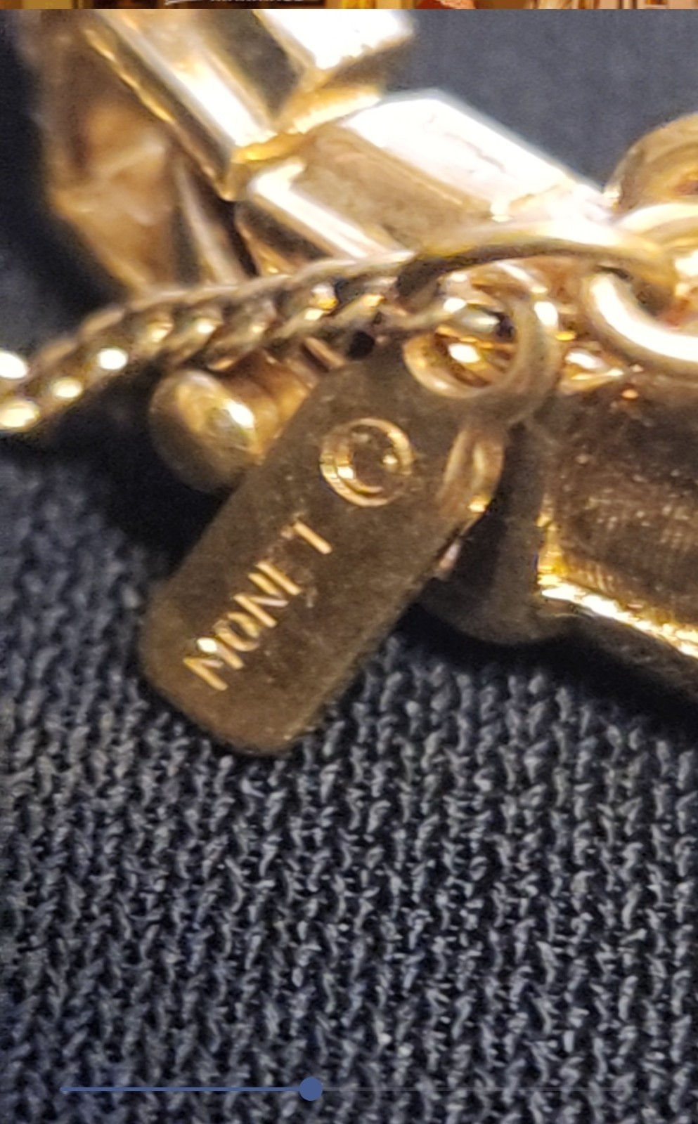 Monet gold tone bracelet with safety chain w/shiny and matte finish