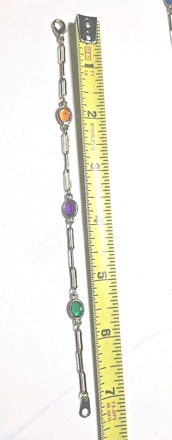 Mid Century 60′ 80′ gold-tone paperclip-style chainoval bezel-set colored Glass