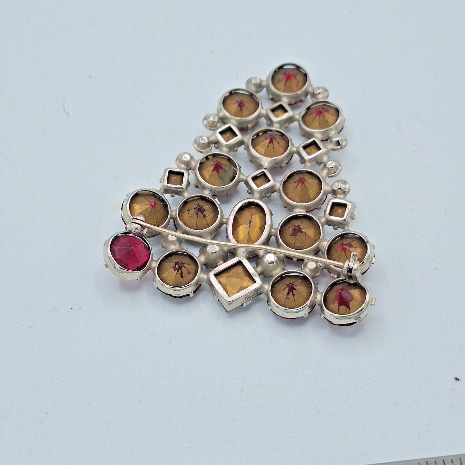 Red and Clear Rhinestone Triangular Brooch Unsigned 2.25″